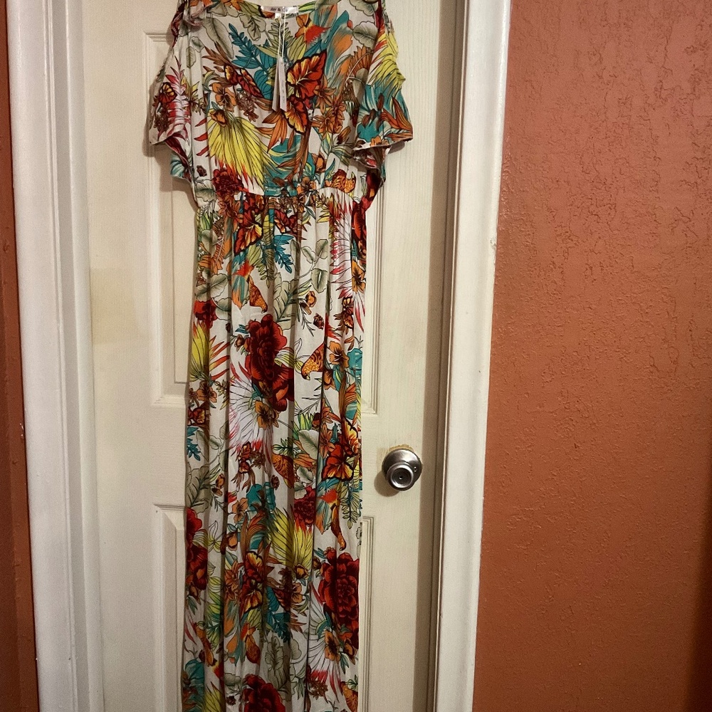 Brand new long maxi multi colored dress with cut out sleeves